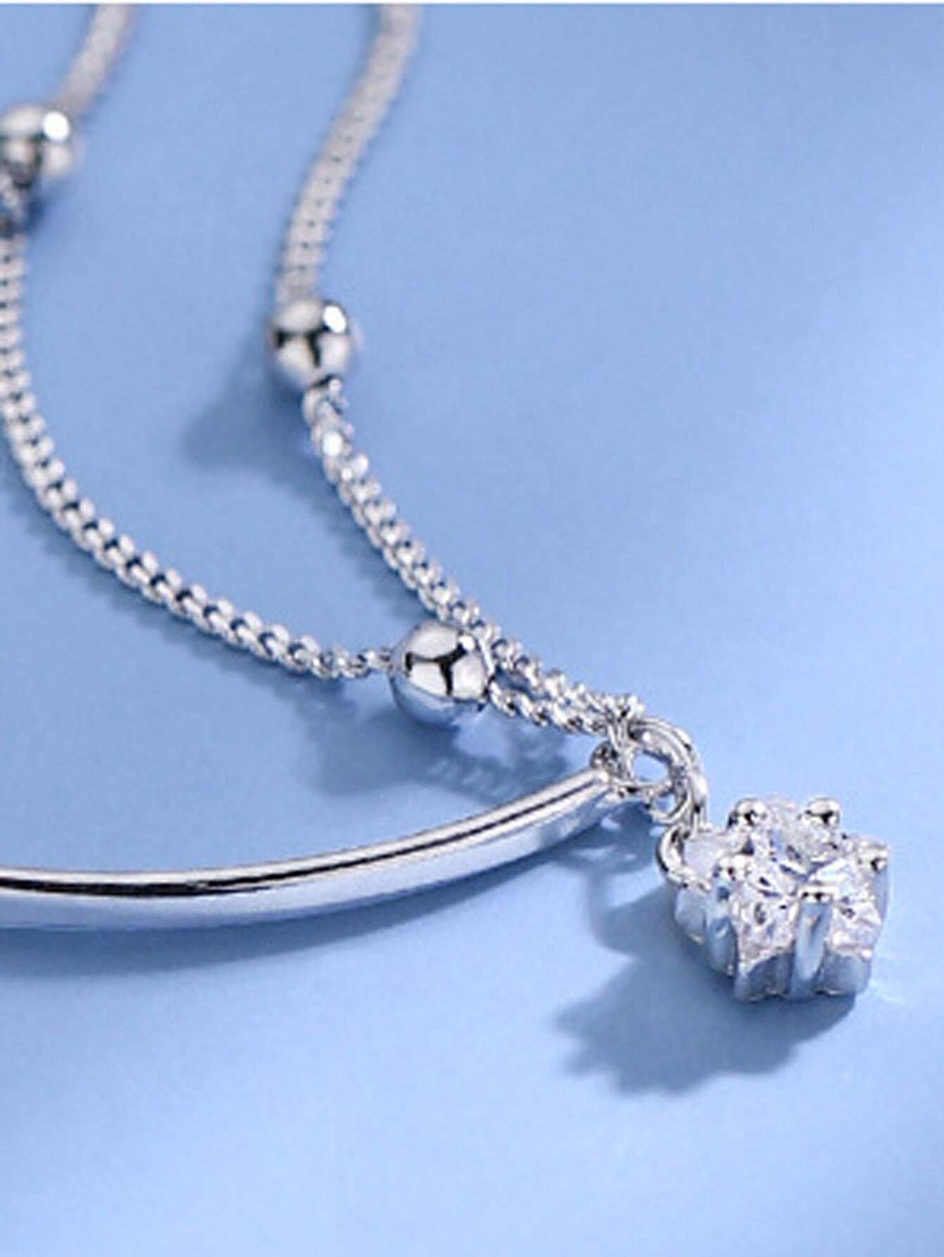 シンプルなハーフチェーンブレスレット デザインにスターが入っていて女性らしさを演出 2層構造